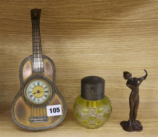 A novelty guitar clock, a perfume bottle and an Art Nouveau figure clock 25cm